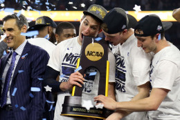 Ryan Arcidiacono #15 of the Villanova Wildcats (L) celebrates with the trophy after defeating the North Carolina Tar Heels 77-74 to win the 2016 NCAA Men's Final Four National Championship game at NRG Stadium on April 4, 2016 in Houston, Texas.  (Photo by Streeter Lecka/Getty Images)