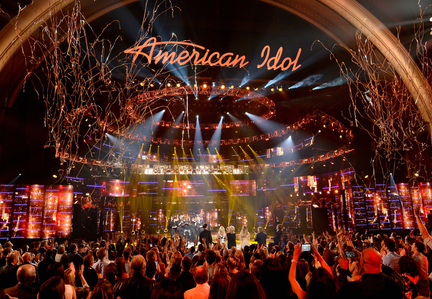 HOLLYWOOD, CALIFORNIA - APRIL 07:  American Idol Season 15 winner Trent Harmon performs coronation song with cast of Season 15 onstage during FOX's "American Idol" Finale For The Farewell Season at Dolby Theatre on April 7, 2016 in Hollywood, California. at Dolby Theatre on April 7, 2016 in Hollywood, California.  (Photo by Kevork Djansezian/Getty Images)