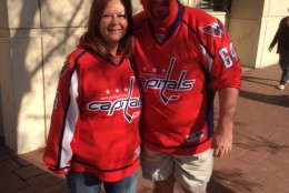 SEEING RED: Jim and Lilly Hoover, from Calvert County, Maryland, are pictured outside the Verizon Center ahead of Game 1 on April 14, 2016. (WTOP/Alan Etter)
