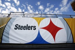 This is a Steelers logo banner on the sidelines at Heinz Field  before an NFL football game between the Pittsburgh Steelers and the Baltimore Ravens in Pittsburgh, Thursday, Oct. 1, 2015. (AP Photo/Gene Puskar)