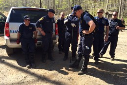 A Virginia State Police recovery team helping in the search for Nicole Mittendorff reunites Monday at the a trail entrance in the Shenandoah National Park.  (Courtesy Virginia State Police)