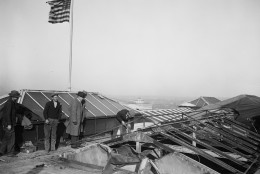 Engineers inspecting the White House roof after the fire, January 1930. (PHOTO: Library of Congress)