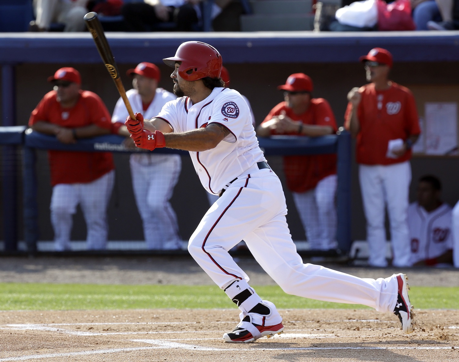 Washington Nationals' Anthony Rendon watches his double against the New York Yankees in the first inning of a spring training baseball game, Wednesday, March 23, 2016, in Viera, Fla. (AP Photo/John Raoux)