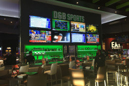 A look at part of the sports bar, and just some of the complex's big screen TVs. (WTOP/Michelle Basch)