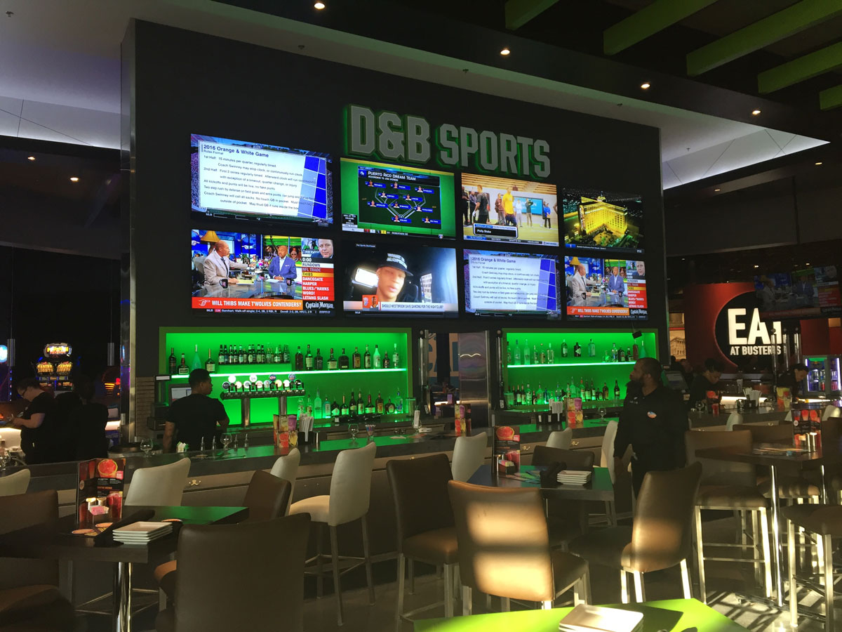 A look at part of the sports bar, and just some of the complex's big screen TVs. (WTOP/Michelle Basch)