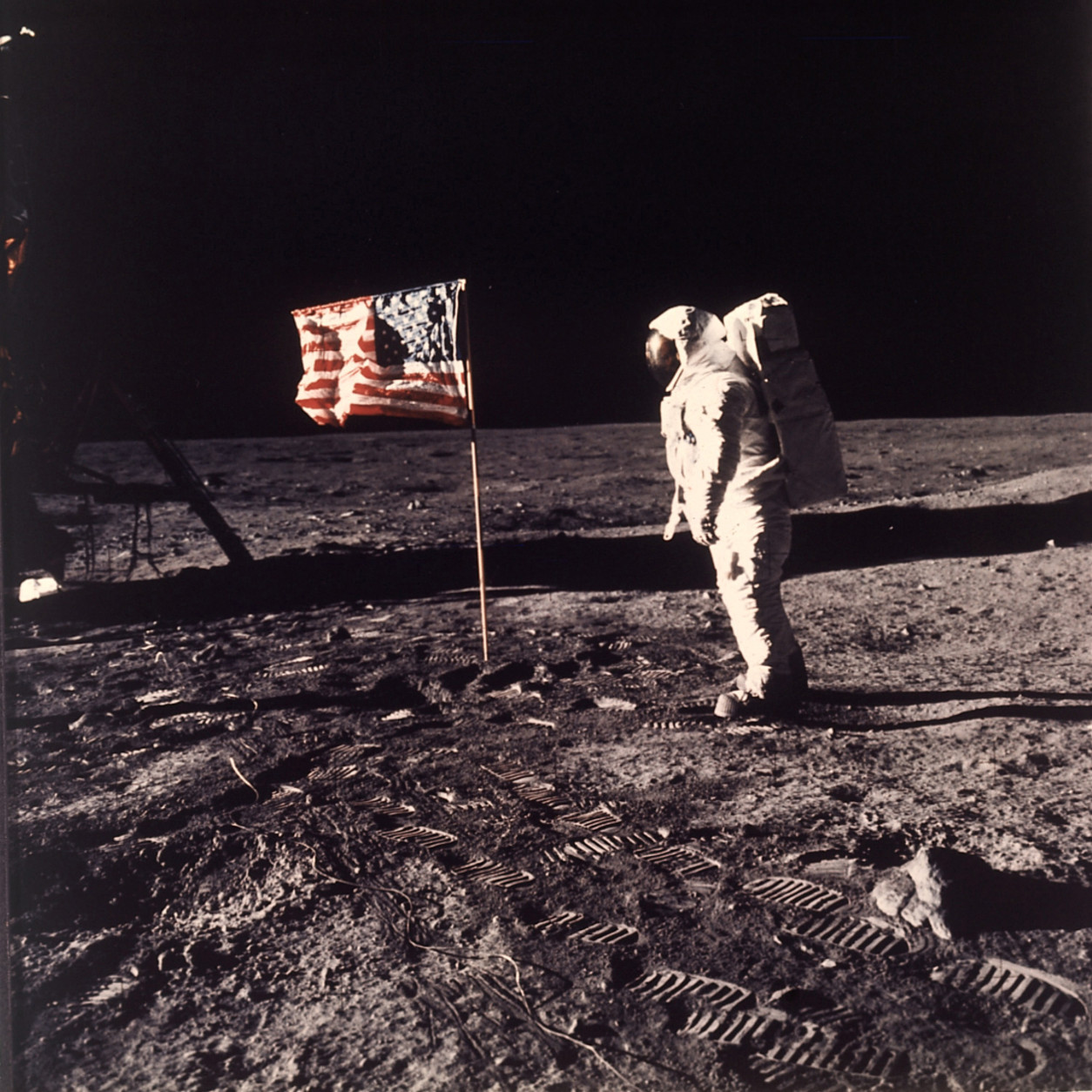 Astronaut Edwin E. "Buzz" Aldrin Jr.  poses for a photograph beside the U.S. flag deployed on the moon during the Apollo 11 mission on July 20, 1969.  Aldrin and fellow astronaut Neil Armstrong were the first men to walk on the lunar surface with temperatures ranging from 243 degrees above to 279 degrees below zero.  Astronaut  Michael Collins flew the command module.  The trio was launched to the moon by a Saturn V launch vehicle at 9:32 a.m. EDT, July 16, 1969. They departed the moon July 21, 1969. (AP Photo/NASA/Neil A. Armstrong)