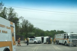 A truck carrying a large pipe overturned, spilling debris onto the road Wednesday. (Courtesy Pete Piringer)