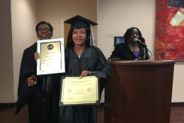 Gail Crump received the "Most Courageous" award. "Despite her initial reluctance, she took a chance on herself and as a result of that she's here graduating today. We're so proud of her," said Dr. Sariah Beatty, Coordinator, Family Treatment Court on right. Pictured also with Judge Pam Gray. (WTOP/Kristi King)