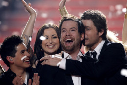 David Cook, center, is congratulated after being named the new American Idol during the season finale of American Idol on Wednesday May 21, 2008, in Los Angeles. (Mark Mainz/AP Images for Fox)