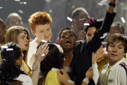 Fantasia Barrino reacts as she is hugged by the other finalists after she was announced the winner of "American Idol" during the live finale, Wednesday, May 26, 2004, in Los Angeles.  (AP Photo/Kevork Djansezian)