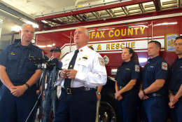 Fairfax County Fire Chief Richard Bowers speaks about missing firefighter/paramedic Nicole Mittendorff while surrounded by fire officials Tuesday morning in Burke, Virginia. Mittendorff was reported missing Friday. Her car was found in a remote parking lot in the Madison County portion of the Shenandoah National Park - more than 70  miles from her Woodbridge home. (WTOP/Nick Iannelli)