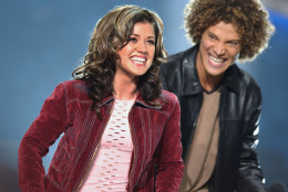 Kelly Clarkson, 20, of Burleson, Texas, left, and Justin Guarini, 23, of Doylestown, Pa., react to Clarkson winning during the final episode of Fox's television competition "American Idol," in Los Angeles, Wednesday, Sept. 4, 2002. The winner earns a recording contract, and will release a CD single later this month and a full album in November. (AP Photo/Lucy Nicholson)