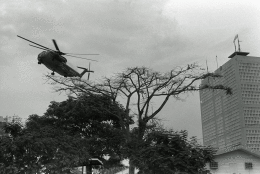 The end of the Vietnam War: A U.S. Marine helicopter lifts off from the landing pad atop the U.S. Embassy during the evacuation of Saigon Wednesday, April 30, 1975. (AP Photo/phu)