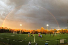 A rainbow pops up over a soccer field in Woodbridge, Virginia. (Courtesy @stimpy1808)