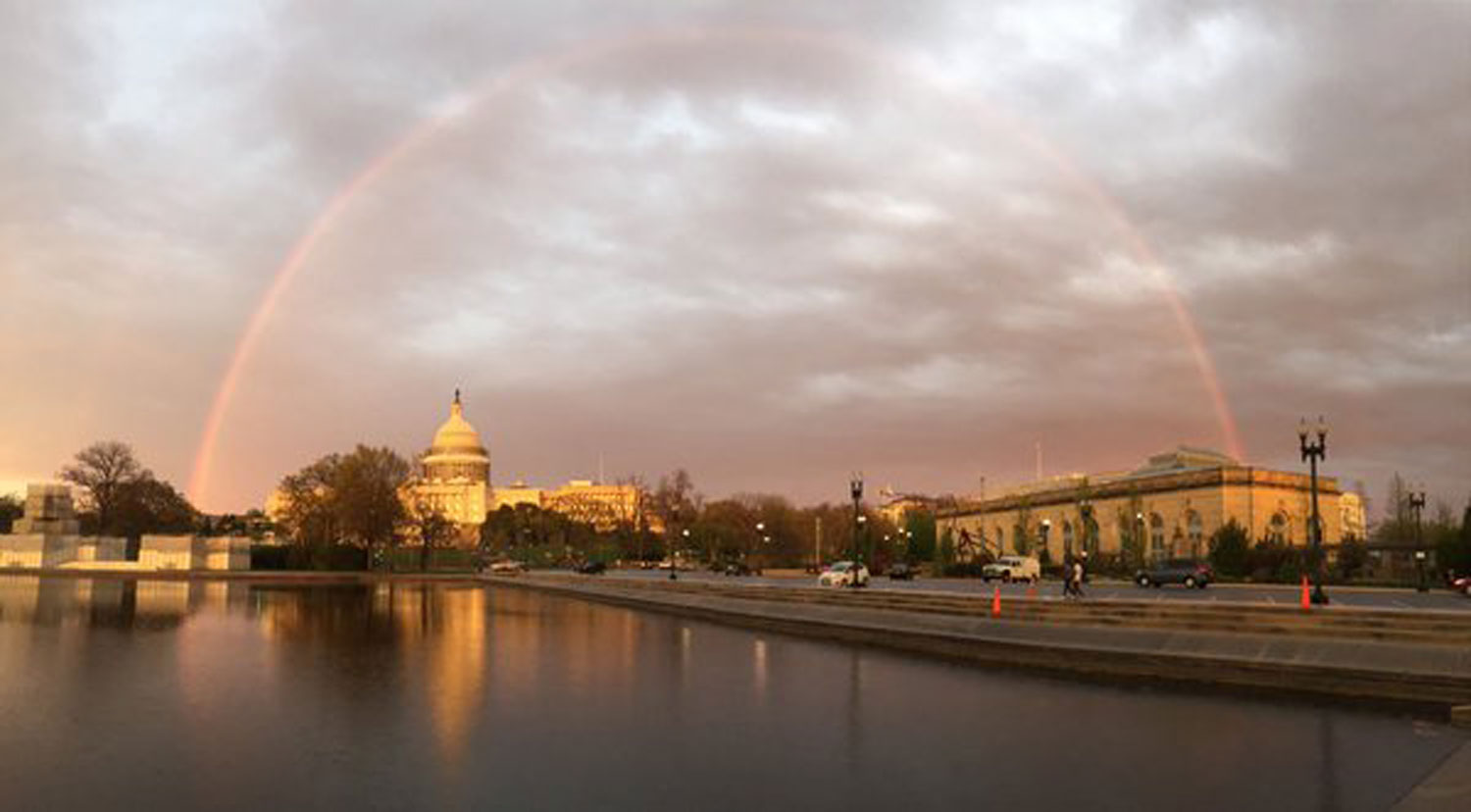 A rainbow is spotted over the U.S. Capitol. (Courtesy @SeanTHenderson)