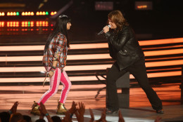 American Idol finalists Jena Irene, left, and Caleb Johnson perform on stage at the American Idol XIII finale at the Nokia Theatre at L.A. Live on Wednesday, May 21, 2014, in Los Angeles. (Photo by Paul A. Hebert/Invision/AP)