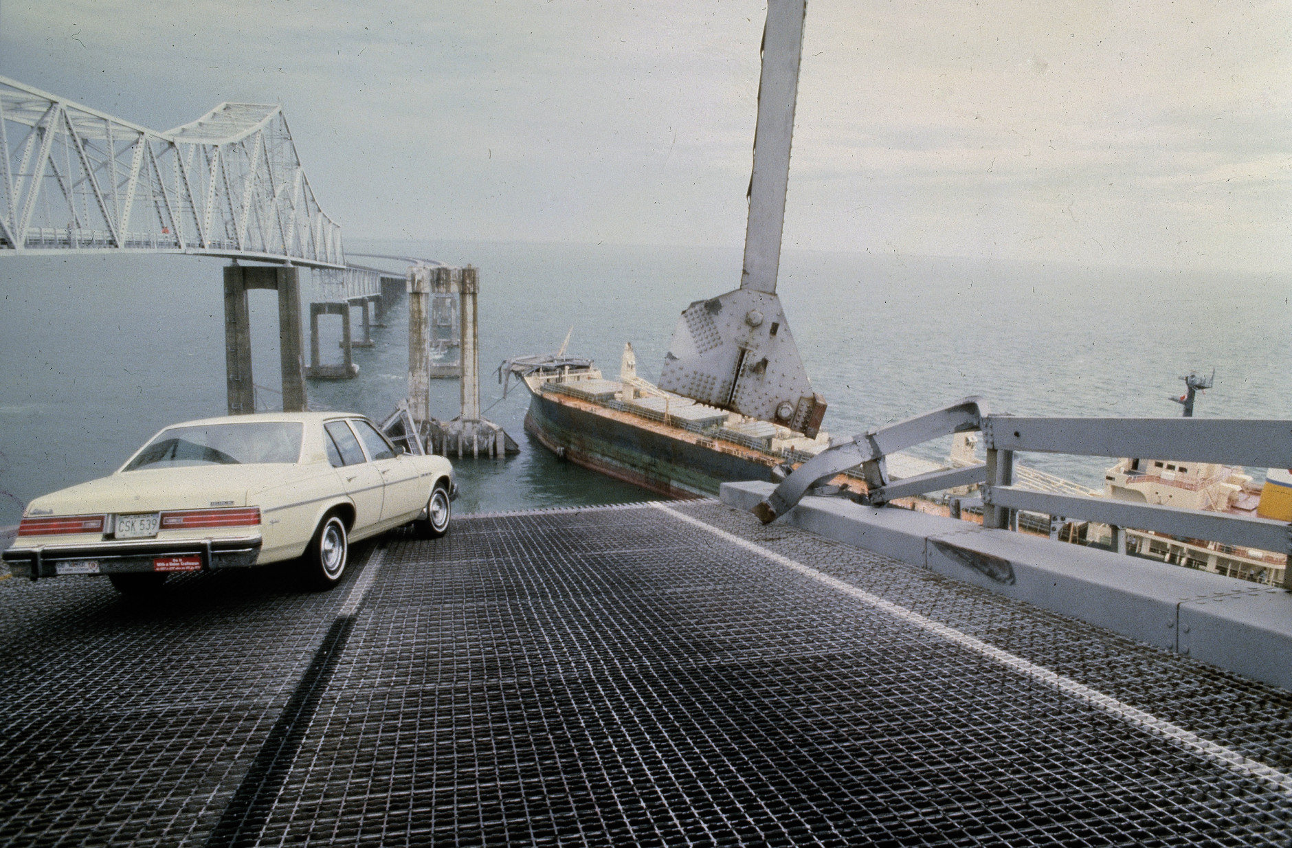 A car is halted at the edge of the Sunshine Skyway Bridge across Tampa Bay, Fla.,  after the freighter Summit Venture struck the bridge during a thunderstorm and tore away a large part of the span, May 1980.  At least 31 persons were killed, 23 of them aboard a bus that toppled into the water.  (AP Photo/Jackie Green)