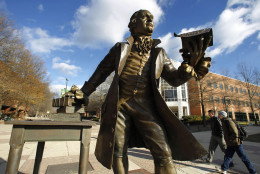 FILE: A statue of George Mason stands in the heart of George Mason University's Fairfax campus in Fairfax, Virginia, Tuesday, Dec 14, 2010.  George Mason University ranked No. 143 on the 2016 Best Colleges report from U.S. News and World Report. (AP Photo/Manuel Balce Ceneta)