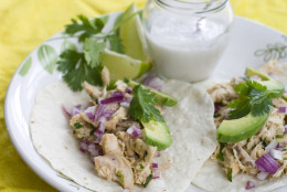 In this undated image shows a plate of coconut-lime pulled chicken tacos in Concord, N.H. (AP Photo/Matthew Mead)