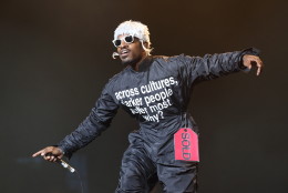 Andre 3000 of Outkast perform at Lollapalooza in Chicago's Grant Park on Saturday, Aug. 2, 2014. (Photo by Steve C.  Mitchell/Invision/AP)