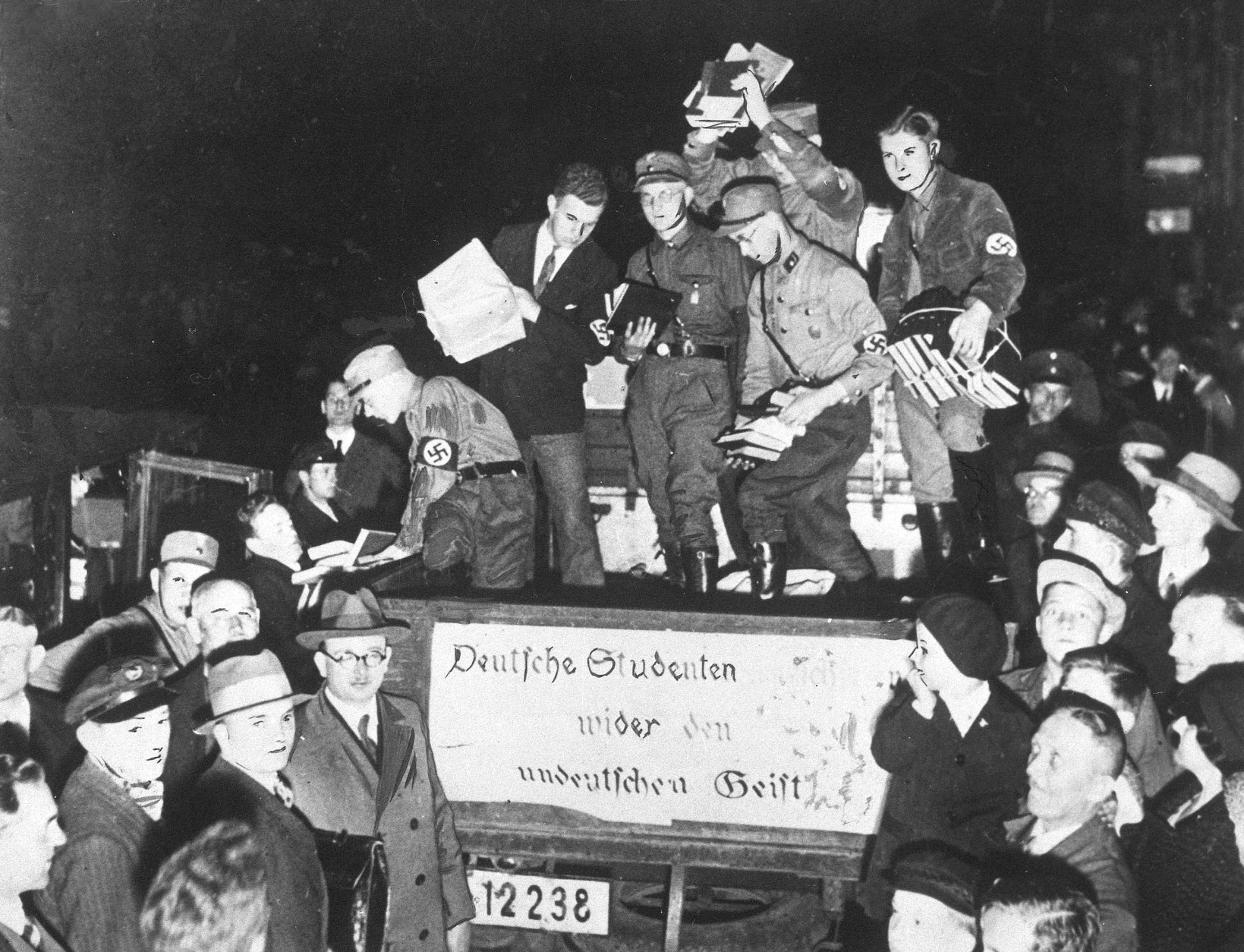 German students collect "un-German books" during the book burning campaign in Nazi Germany in 1933.  (AP Photo)