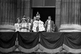 King George VI and Queen Elizabeth on the balcony of Buckingham Palace, in London, on their return from Westminster Abbey, on May 12, 1937, following their Coronation service. (AP Photo)