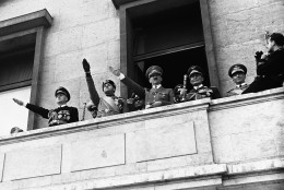 The military Alliance of the Rome-Berlin Axis was signed, in the new Reichs Chancellery at Berlin. 
German Chancellor Adolf Hitler and his Italian guests appeared on the balcony of the new Reichs Chancellery, Berlin, on May 22, 1939, after the signing of the pact. From left to right are German Navy Chief Grand Admiral Erich Raeder, Italian Foreign Minister Count Ciano, German Army chief General Walter Von Brauchtisch, Chancellor Adolf Hitler, and Field Marshal Hermann Goering. (AP Photo)