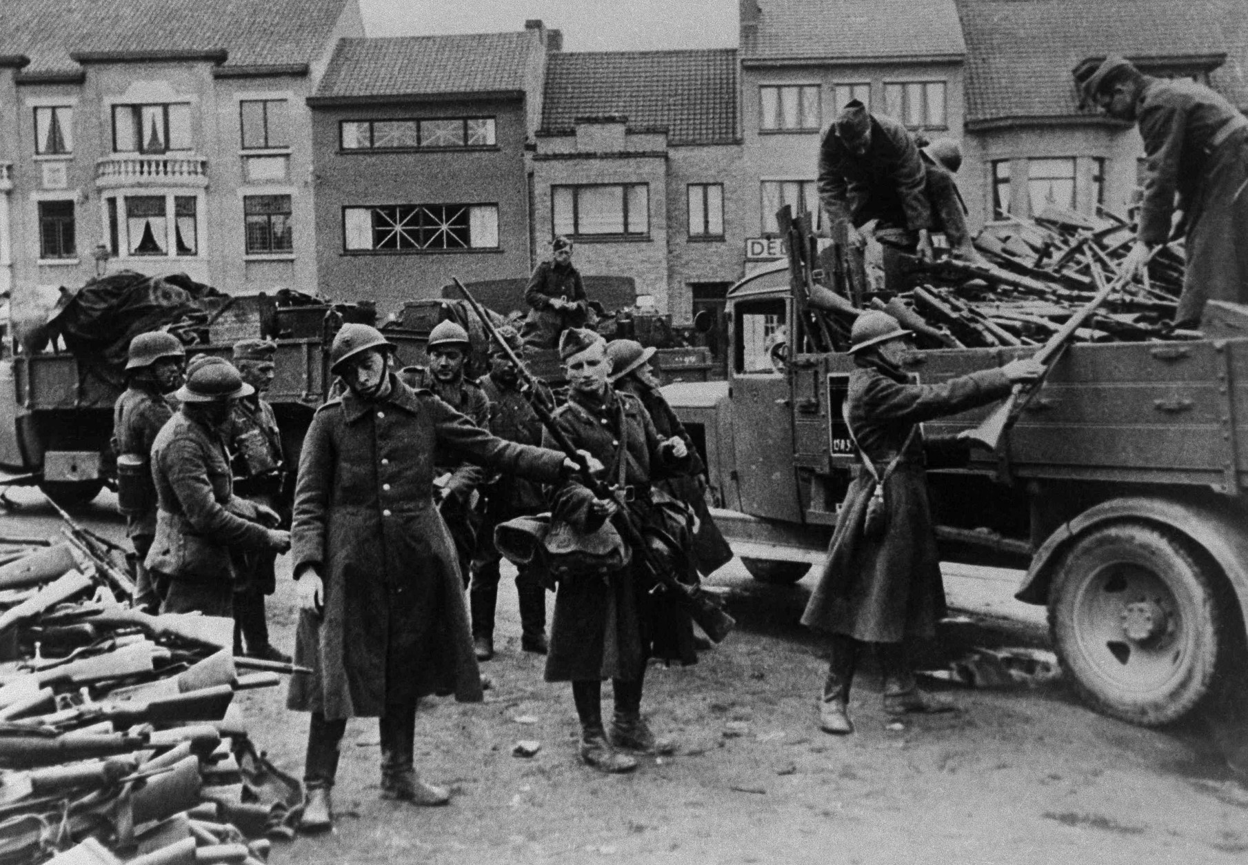 Upon decision of King Leopold 3rd of Belgium, the Belgian army surrendered, May 28, 1940. The disarming of Belgian soldiers the arms are being stacked under German observation. (AP Photo)