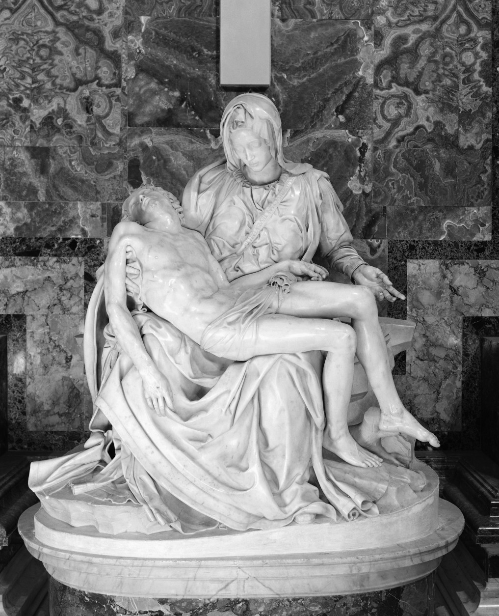 General view of famed Pieta sculpture, created by Michelangelo, shown, Dec.12, 1962, Saint Peters Basilica, Rome, Italy. The statue depicts Mary with the dead Christ lying across her knee, was made by Michelangelo when he was only 25 years old. It is slated to be shipped to America for the 1964 World's Fair, at the request of Francis Cardinal Spellman, Archbishop of New York, to which Pope John XXIII agreed. (AP Photo/Mario Torrisi)
