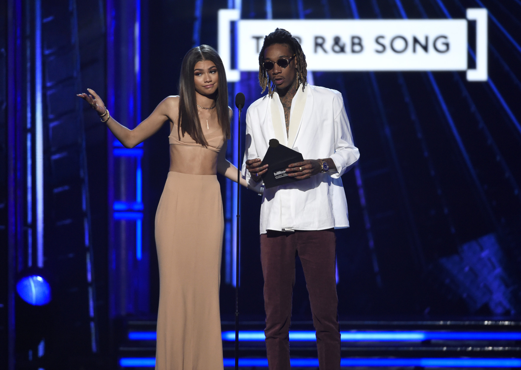 Zendaya, left, and Wiz Khalifa present the award for top R&amp;B song at the Billboard Music Awards at the T-Mobile Arena on Sunday, May 22, 2016, in Las Vegas. (Photo by Chris Pizzello/Invision/AP)