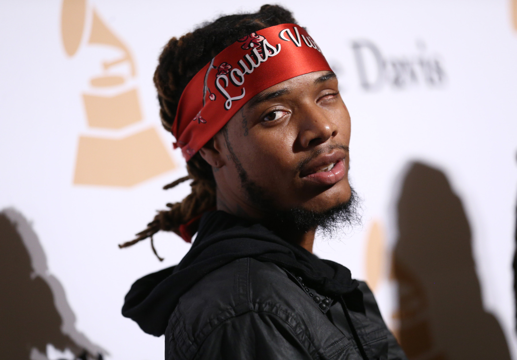 Fetty Wap arrives at the 2016 Clive Davis Pre-Grammy Gala at the Beverly Hilton Hotel on Sunday, Feb. 14, 2016, in Beverly Hills, Calif. (Photo by John Salangsang/Invision/AP)