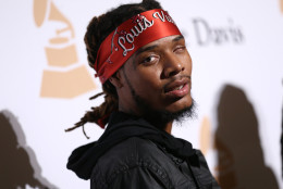 Fetty Wap arrives at the 2016 Clive Davis Pre-Grammy Gala at the Beverly Hilton Hotel on Sunday, Feb. 14, 2016, in Beverly Hills, Calif. (Photo by John Salangsang/Invision/AP)