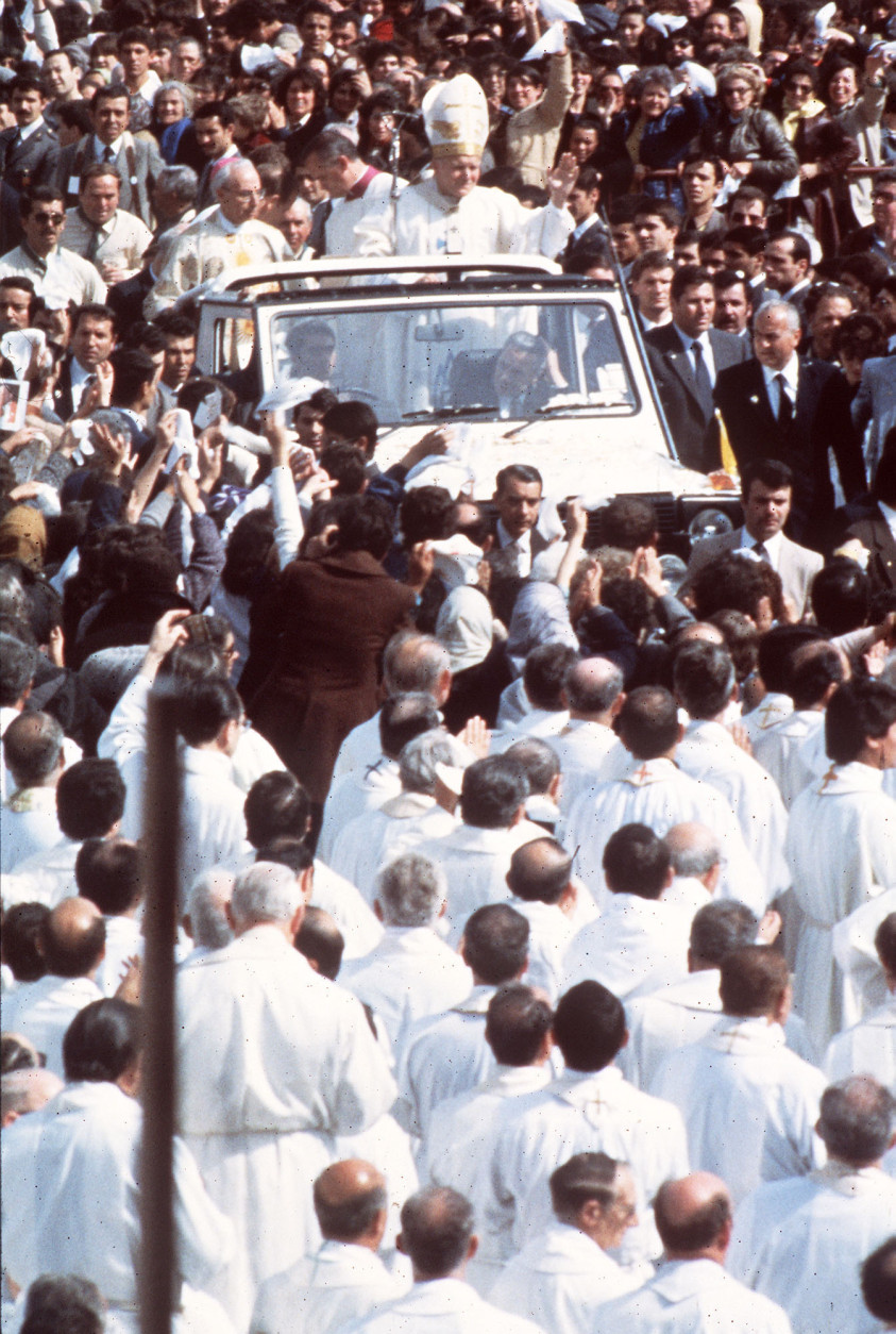 In this May 12, 1982 file photo Pope John Paul II is seen on his popemobile after he celebrated a mass in Fatima Square, Portugal, May 12, 1982.  The longtime private secretary of the late Pope John Paul II has revealed that the pope was wounded in a 1982 knife attack by a priest in Portugal. Cardinal Stanislaw Dziwisz makes the revelation in "Testimony,'' a movie on John Paul's life that was screened for Pope Benedict XVI at the Vatican on Thursday, Oct. 16, 2008.  It was known that John Paul was assaulted by a knife-wielding Spanish priest while visiting the shrine of Fatima in Portugal to give thanks for surviving an assassination attempt in 1981, when he was shot by a Turkish gunman in St. Peter's Square. (AP Photo)
