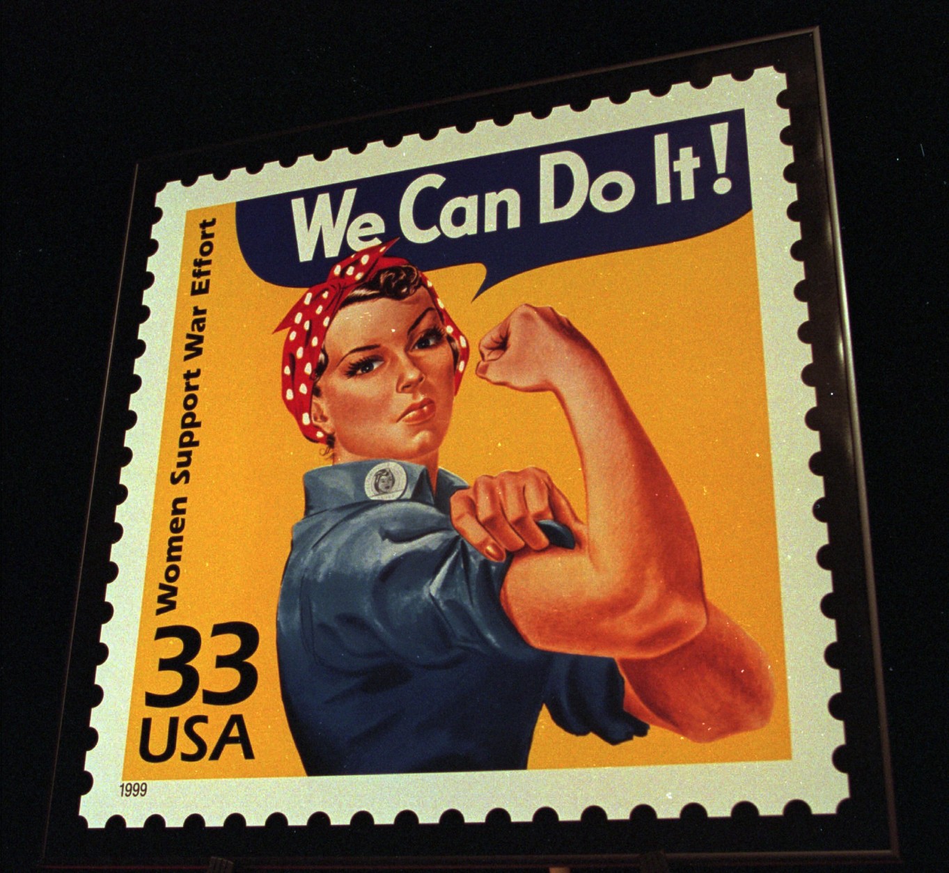 The United States Post Office presented an enlargement of the Celebrate the Century, Women Support the War stamp depicting Rosie the Riveter to the Portland Harbor Museum in South Portland, Maine,  Friday, June 25, 1999. The stamp is part of a 15 stamp set honoring people, events, and lifestyles of the 1940's. (AP Photo/Joan Seidel)