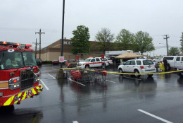 Montgomery County police investigate the death of a woman who was shot in the parking lot of a Giant grocery store on Connecticut Avenue in Aspen Hill Friday, May 6, 2016. (WTOP/Kristi King)