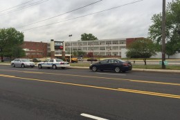 One adult is dead and another person is injured after an apparent domestic-related shooting at a Prince George’s County high school Thursday afternoon. (WTOP/Michelle Basch)