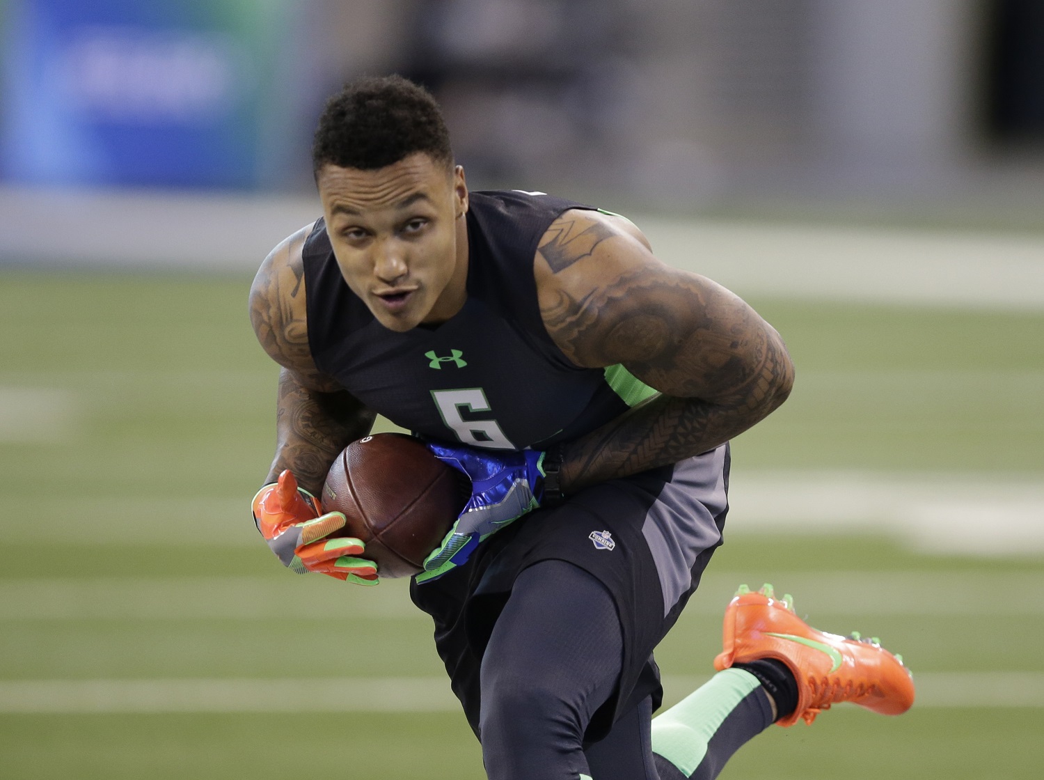 USC linebacker Su'A Cravens runs a drill at the NFL football scouting combine on Sunday, Feb. 28, 2016, in Indianapolis. (AP Photo/Darron Cummings)