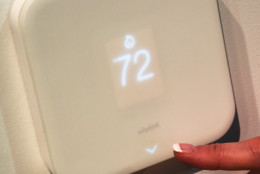 LAS VEGAS, NV - JANUARY 07:  The Vivint Element Thermostat is displayed at CES 2016 at the Sands Expo and Convention Center on January 7, 2016 in Las Vegas, Nevada. The Element, part of the Vivint Sky smart home system, senses if you're at home or away and if you're sleeping and adjusts the temperature according to your settings. IT can also be accessed from any mobile device. CES, the world's largest annual consumer technology trade show, runs through January 9 and features 3,600 exhibitors showing off their latest products and services to more than 150,000 attendees.  (Photo by Ethan Miller/Getty Images)