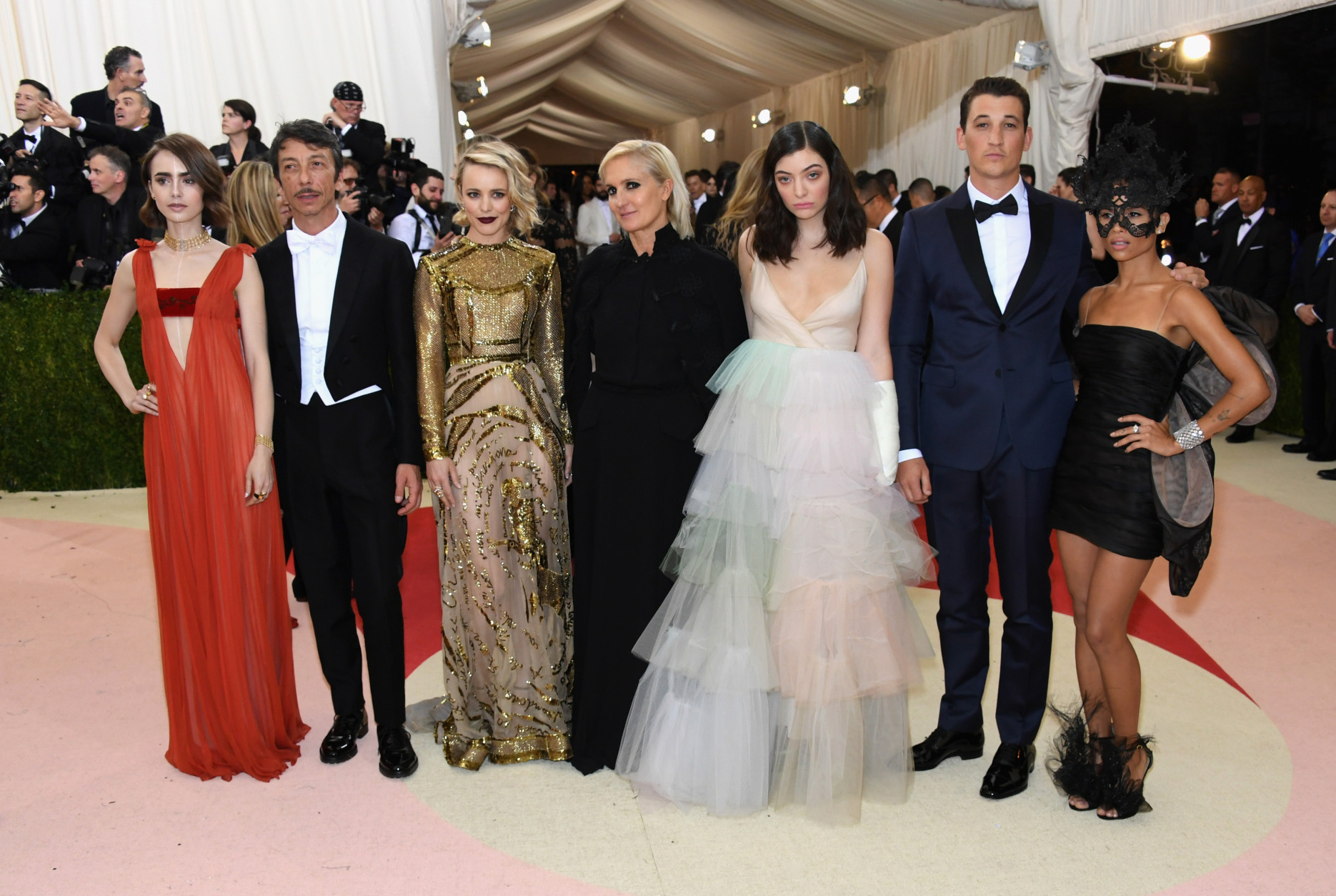 (L-R) Lily Collins, Pierpaolo Piccioli, Rachel McAdams, Maria Grazia Chiuri, Lorde, Miles Teller, and Zoe Kravitz attend the "Manus x Machina: Fashion In An Age Of Technology" Costume Institute Gala at Metropolitan Museum of Art on May 2, 2016 in New York City.  (Photo by Larry Busacca/Getty Images)