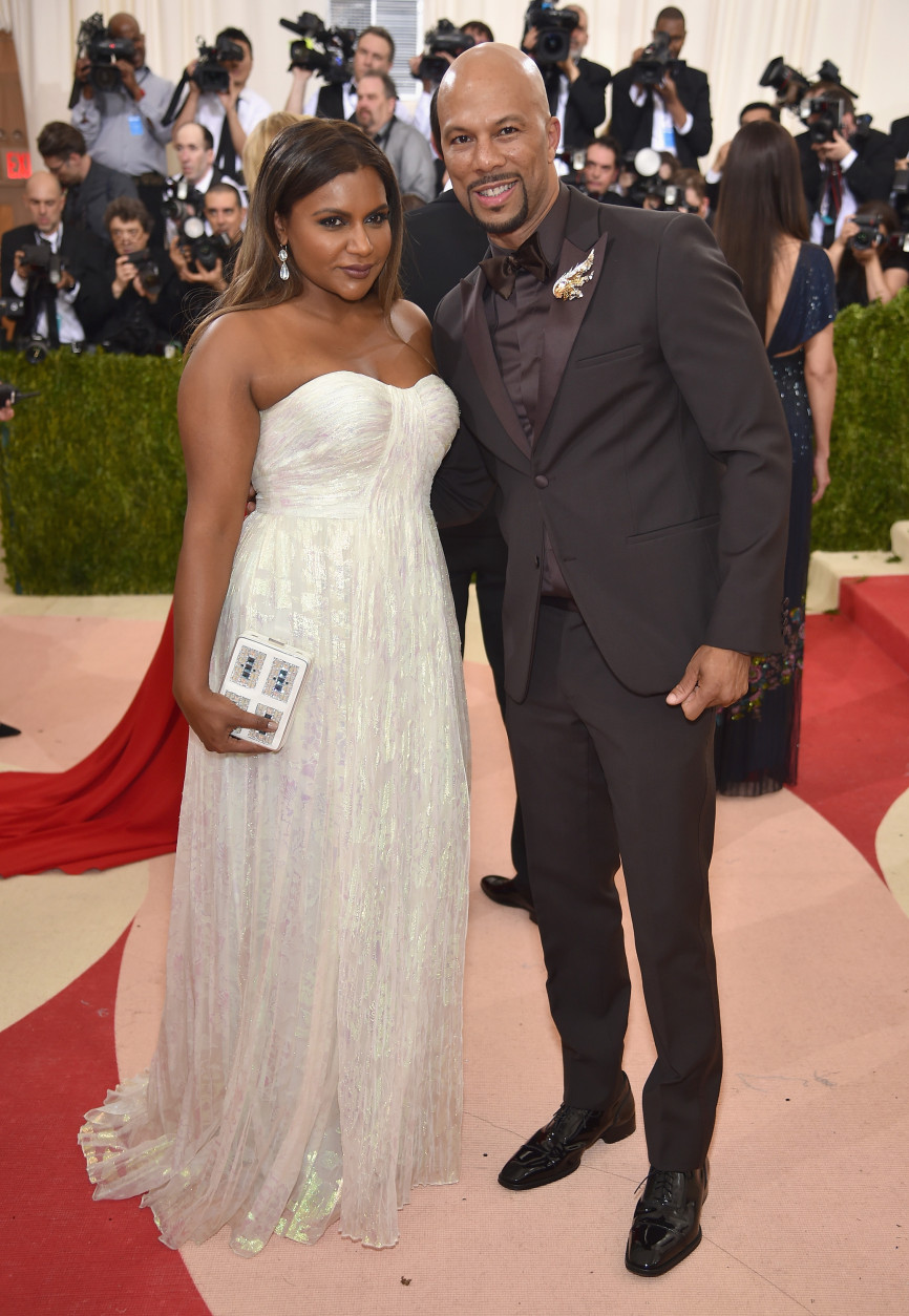 Mindy Kaling (L) and Common attend the "Manus x Machina: Fashion In An Age Of Technology" Costume Institute Gala at Metropolitan Museum of Art on May 2, 2016 in New York City.  (Photo by Dimitrios Kambouris/Getty Images)
