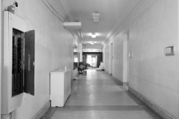 After sifting through hundreds and hundreds of photos, D.C. Council spokesman Josh Gibson came across this image, which shows mystery plaque hanging in the hallway of the Wilson Building -- a major lead. (Courtesy  Josh Gibson/D.C. Council)