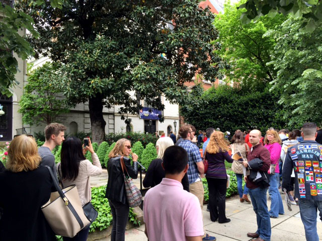 People wait in line outside the Embassy of the Bahamas during the Embassy Tour in D.C. on Saturday, May 7, 2016. (WTOP/Dennis Foley)