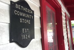 A plaque next to the front door indicates the tiny eatery's age. (WTOP/Michelle Basch)