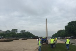 Crews are seen laying down sod on the lawn of the National Park. (Courtesy National Park Service)