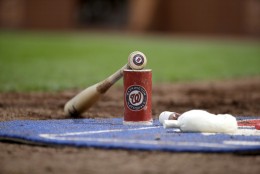 A bat belonging to Washington Nationals' Ryan Zimmerman is seen in the on-deck circle during the eighth inning of a baseball game between the St. Louis Cardinals and the Washington Nationals Saturday, April 30, 2016, in St. Louis. The Nationals won 6-1. (AP Photo/Jeff Roberson)