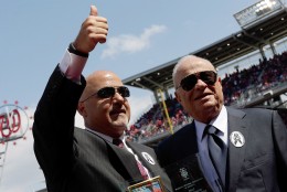 WASHINGTON, DC - APRIL 01:  Washington Nationals General Manager Mike Rizzo (L) gives a thumbs up to the crowd with Nationals owner Ted Lerner while accepting an award for MLB Executive of the Year before the Opening Day game against the Miami Marlins at Nationals Park on Monday, April 1, 2013 in Washington, DC.  (Photo by Win McNamee/Getty Images)