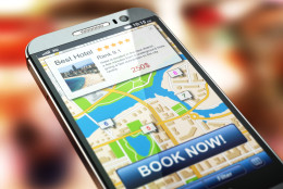 Online accommodation booking concept. Smartphone and system  hot