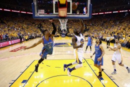 OAKLAND, CA - MAY 30:  Draymond Green #23 of the Golden State Warriors goes up for a shto on Russell Westbrook #0 of the Oklahoma City Thunder in Game Seven of the Western Conference Finals during the 2016 NBA Playoffs at ORACLE Arena on May 30, 2016 in Oakland, California. NOTE TO USER: User expressly acknowledges and agrees that, by downloading and or using this photograph, User is consenting to the terms and conditions of the Getty Images License Agreement.  (Photo by Ezra Shaw/Getty Images)
