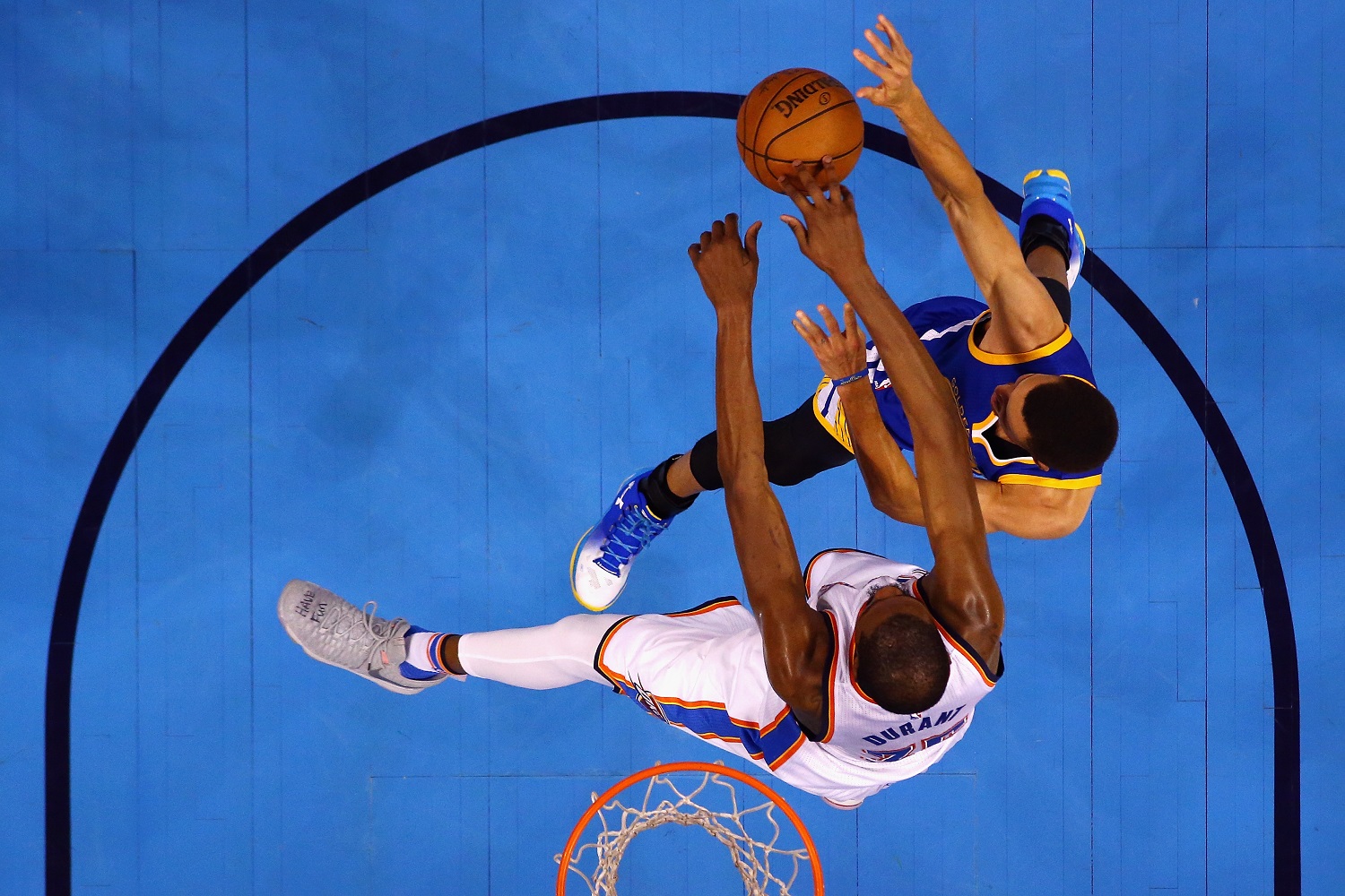 OKLAHOMA CITY, OK - MAY 28:  Kevin Durant #35 of the Oklahoma City Thunder defends Stephen Curry #30 of the Golden State Warriors during the first half in game six of the Western Conference Finals during the 2016 NBA Playoffs at Chesapeake Energy Arena on May 28, 2016 in Oklahoma City, Oklahoma. NOTE TO USER: User expressly acknowledges and agrees that, by downloading and or using this photograph, User is consenting to the terms and conditions of the Getty Images License Agreement.  (Photo by Maddie Meyer/Getty Images)