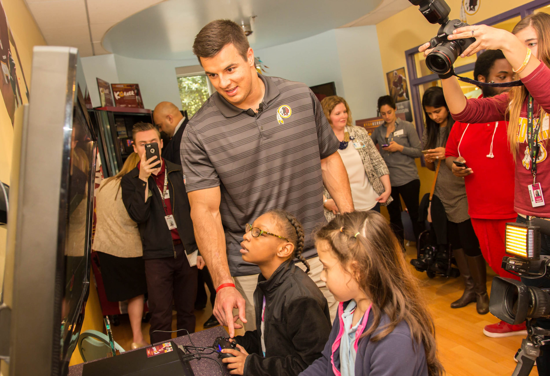 Redskins linebacker Ryan Kerrigan joked that the kids didn't want to play football but rather another video game that was 'more fun.' (Courtesy Prolanthropy)